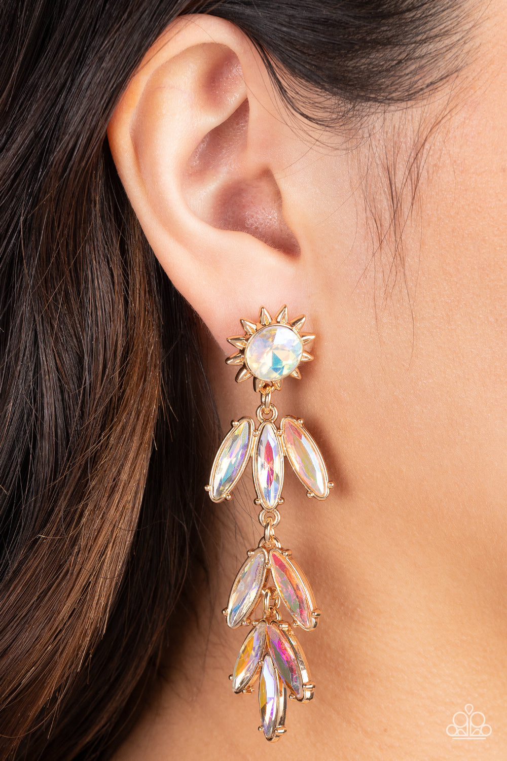 Space Age Sparkle  - Gold Iridescent Earrings - Paparazzi Accessories - A gold sunburst frame wraps around an iridescent gem as it gives way to an explosion of marquise-cut rhinestones in the same dreamy finish. The oblong frames swing dramatically from the ear, capturing and reflecting light at every turn.
