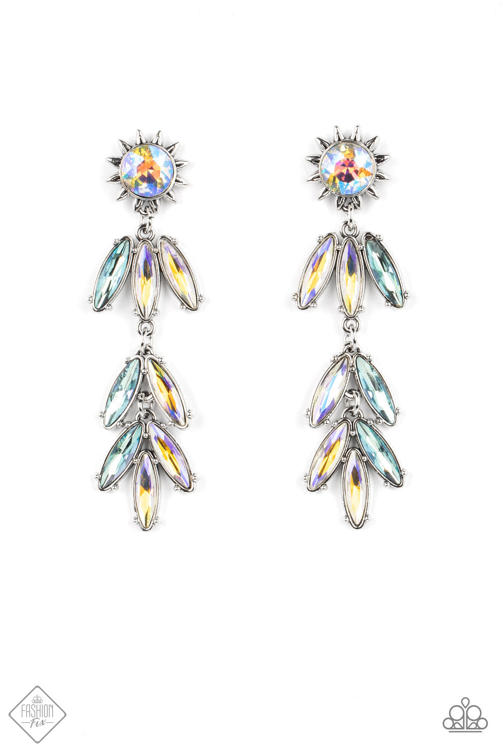 Space Age Sparkle - Iridescent Multi Color Gem - Fashion Earrings - Paparazzi Accessories - A silver sunburst frame wraps around an iridescent gem as it gives way to an explosion of marquise cut rhinestones in the same dreamy finish. The oblong frames swing dramatically from the ear, capturing and reflecting light at every turn. Earring attaches to a standard post fitting. Bejeweled Accessories By Kristie - Trendy fashion jewelry for everyone -