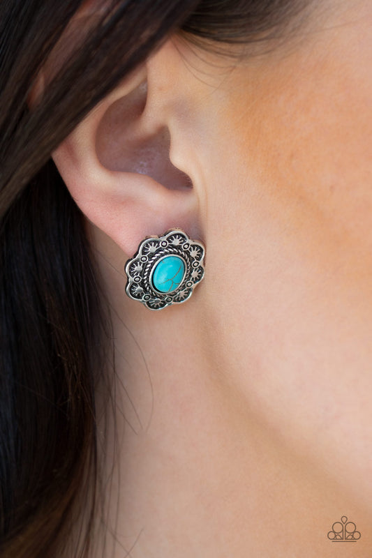 Springtime Deserts - Blue Turquoise and Silver Post Earrings - Paparazzi Accessories - A refreshing turquoise stone is pressed into a silver floral frame radiating with sunburst patterns for a rustic look. Earring attaches to a standard post fitting. Sold as one pair of post earrings.