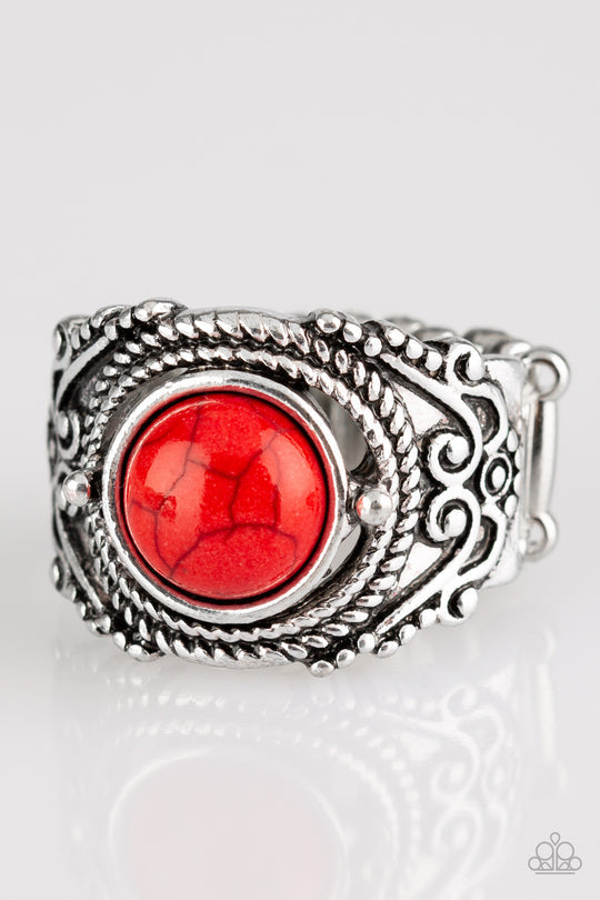 Stand Your Ground - Red and Silver Ring - Paparazzi Accessories - A fiery red stone is pressed into an ornate silver band radiating with rope-like and studded textures for a seasonal look. Features a stretchy band for a flexible fit stylish ring.