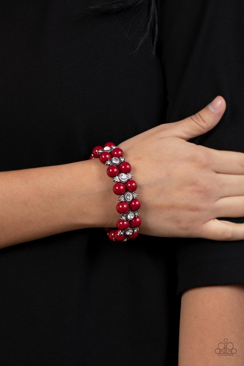 Starlight Reflection - Red Stretchy Fashion Bracelet - Paparazzi Accessories - Pairs of Fire Whirl beads join white rhinestone encrusted silver frames along stretchy bands around the wrist, resulting in a refined pop of color. Sold as one individual bracelet.