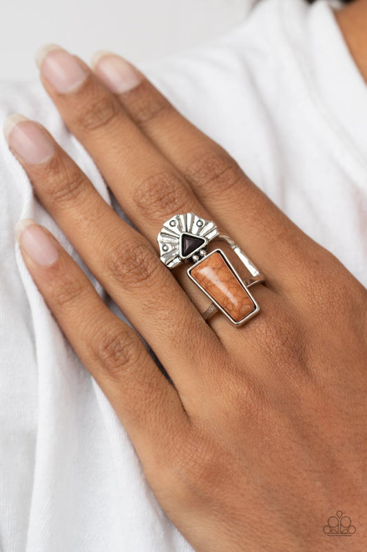 Stellar Stones - Brown and Silver Ring - Paparazzi Accessories - A silver dotted fan flares out from a dainty triangular black stone atop the studded top of a trapezoidal Adobe stone, resulting in an abstract and earthy centerpiece atop layered silver bands.