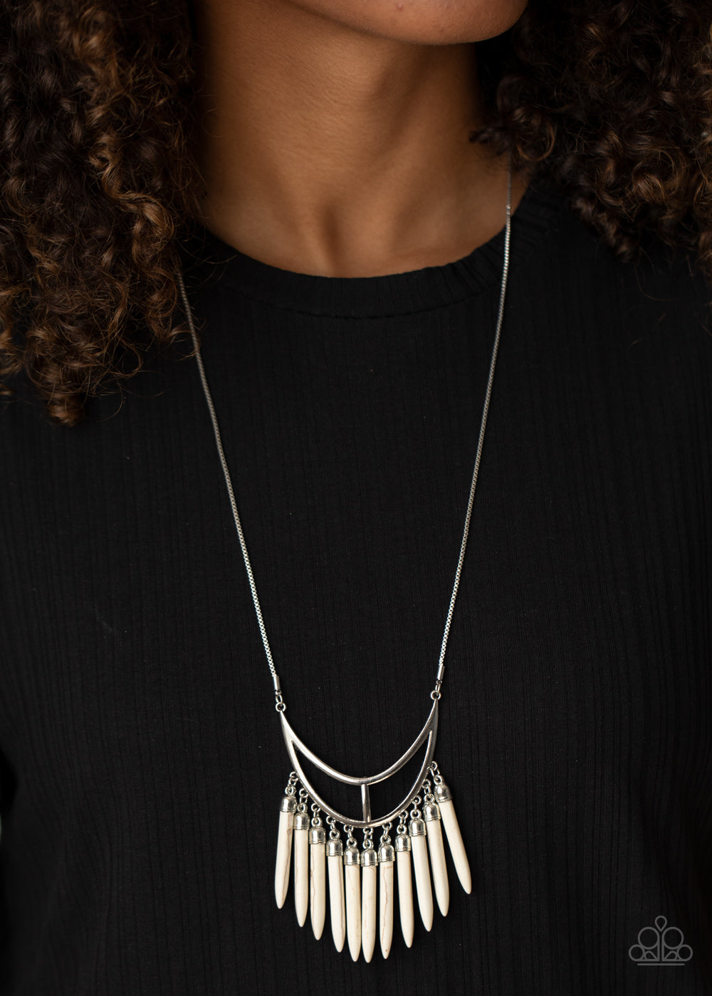 Stone Age A-Lister - White and Silver Necklace - Paparazzi Accessories - Capped in dainty silver fittings, refreshing white stone tusk-like bars dangle from the bottom of an airy silver crescent frame, creating an earthy fringe at the bottom of a lengthened silver chain. Features an adjustable clasp closure. Sold as one individual necklace.