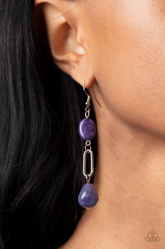 Stone Apothecary - Purple Amethyst and Silver Earrings - Paparazzi Accessories - Flat oval and faceted teardrop amethyst stones link with a silver oval frame, creating an earthy lure. Earring attaches to a standard fishhook fitting.  Sold as one pair of earrings.