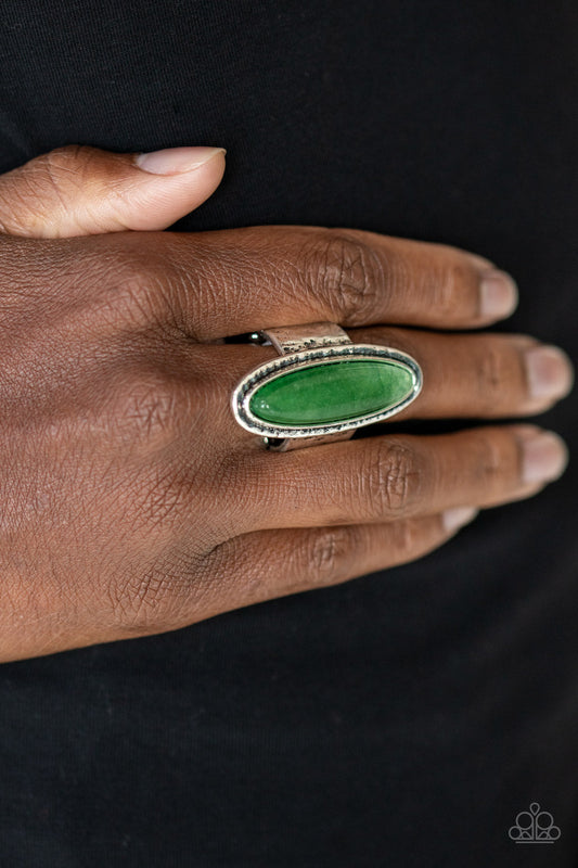 Stone Mystic - Green and Silver Ring - Paparazzi Accessories - An oblong green stone sits atop a hammered silver frame atop a hammered silver band, creating an earthy statement piece. Features a stretchy band for a flexible fit. Sold as one individual ring. Trendy fashion jewelry for everyone .