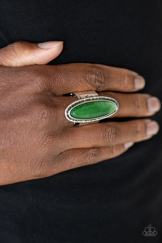 Stone Mystic - Green and Silver Ring - Paparazzi Accessories - An oblong green stone sits atop a hammered silver frame atop a hammered silver band, creating an earthy statement piece. Features a stretchy band for a flexible fit. 