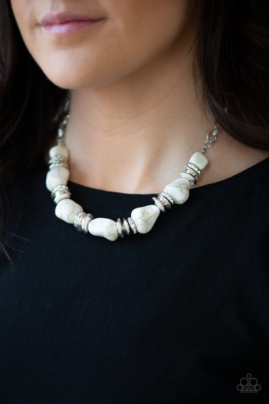 Stunningly Stone Age - White and Silver Necklace - Paparazzi Accessories - A collection of refreshing white stones, shimmery silver accents, and white rhinestone encrusted rings are strung below the collar for a timeless look fashion necklace.