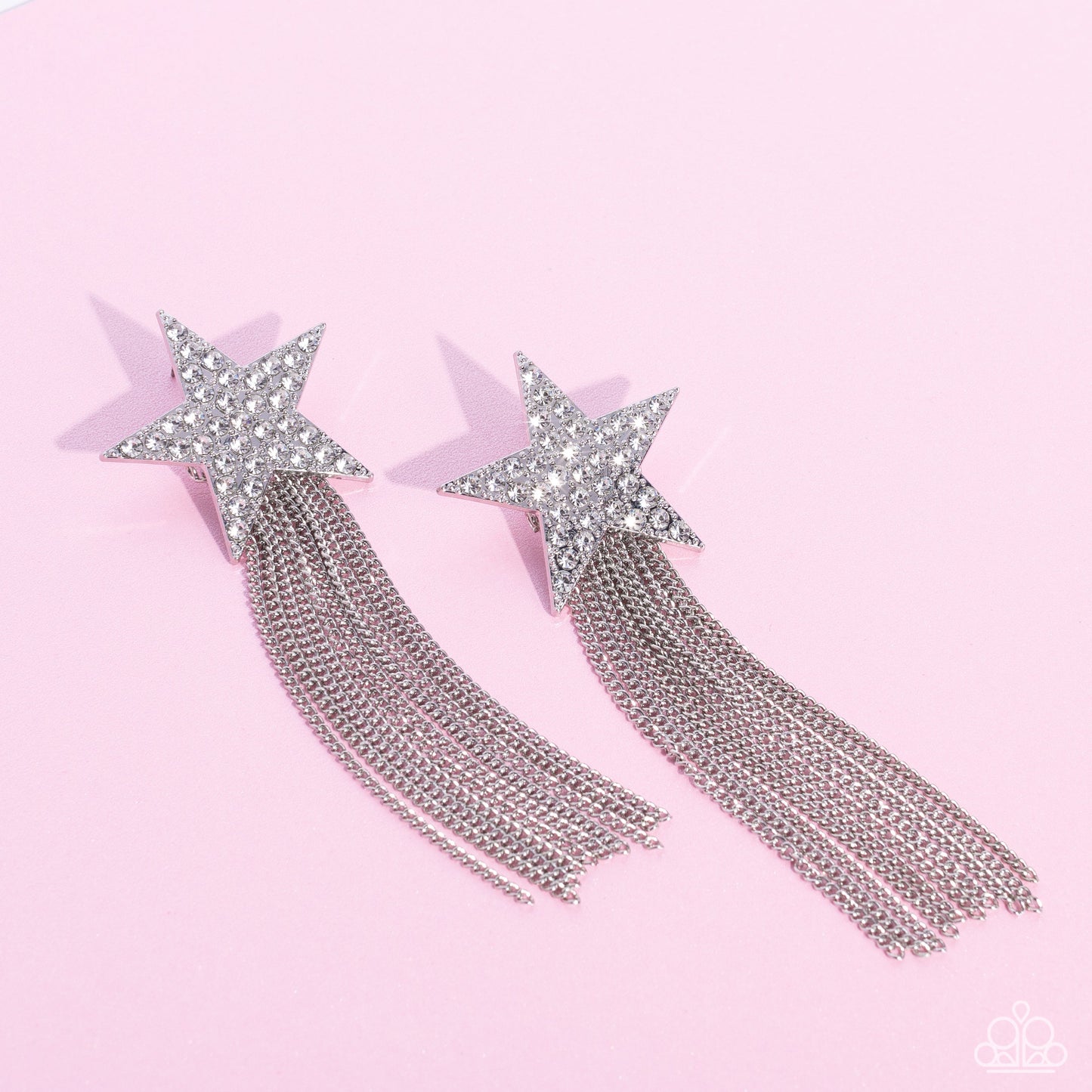 Superstar Solo - White and Silver Earrings - Paparazzi Accessories - Superstar Solo - White and Silver Earrings - Paparazzi Accessories - A curtain of silver chains streams out from the bottom of an oversized silver star encrusted in blinding white rhinestones, resulting in a stellar tassel.