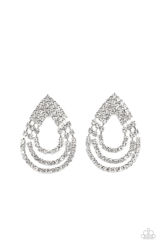 Take a POWER Stance - Silver Fashion Earrings - Paparazzi Accessories - Loops of glassy white rhinestones ripple out from the bottom of a stationary triangular fitting that is dotted in glittery white rhinestones, resulting in a timeless teardrop chandelier. Earring attaches to a standard post fitting. Sold as one pair of post earrings.