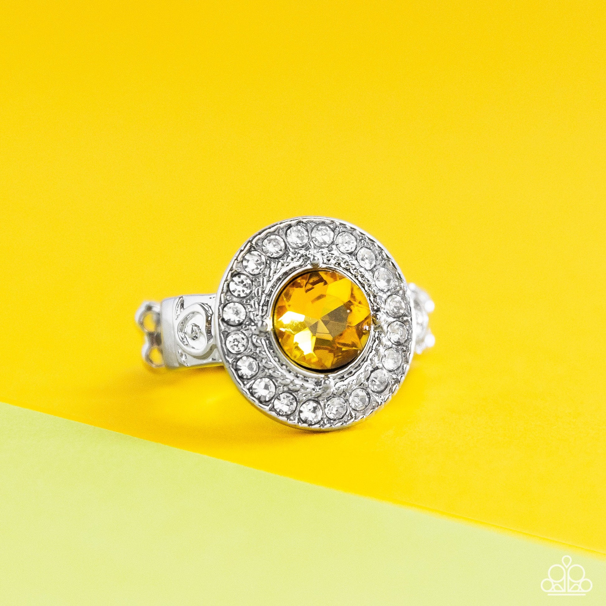 Targeted Timelessness - Yellow and Silver Ring - Paparazzi Accessories - Featuring a pronged silver fitting, an oversized yellow gem sits atop a radiant ring of glassy white rhinestones for a timeless fashion.
