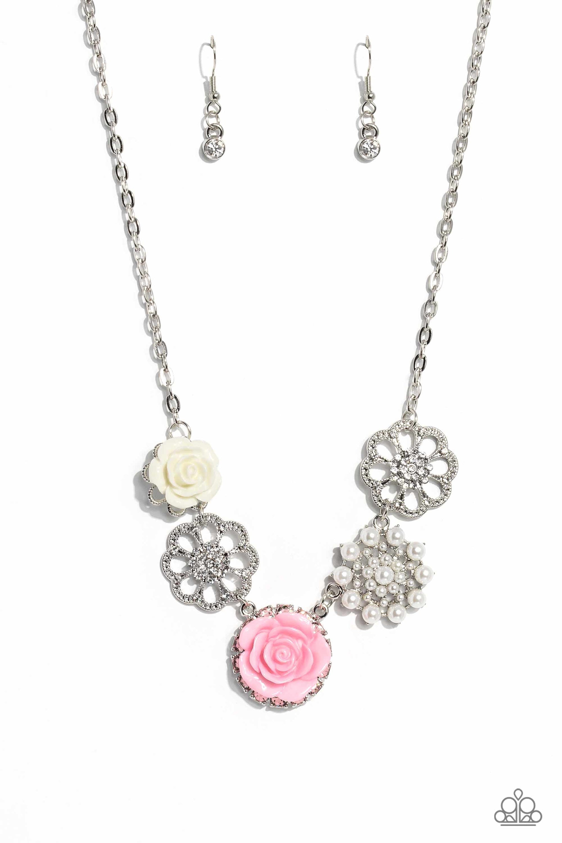 Tea Party Favors - Pink and Silver Necklace - Paparazzi Accessories - A collection of whimsical, refined flowers gathers along a flat, sleek silver link chain. The featured charms include an ivory resin rose blooming atop a glittery silver floral silhouette, two silver flowers dusted with dainty white rhinestones and studs around its petals and centers, a baby pink resin rose blooming atop a fan of white gems, and a pearl-petaled and centered flower creating a floral fantasy around the collar.