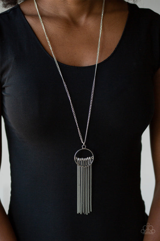 Terra Tassel - Silver Fashion Necklace - Paparazzi Accessories - Infused with a shimmery silver chain fringe, a row of gray beads is threaded along a silver rod that is fitted in place inside the center of an airy silver ring. The colorful pendant swings from the bottom of a lengthened silver chain for a trendy tribal look. Features an adjustable clasp closure. Sold as one individual necklace. 