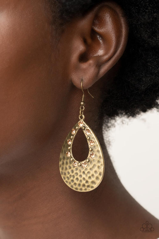 Terraform Twinkle - Brown Brass Earrings - Paparazzi Accessories - The airy center of a hammered brass teardrop is adorned in dainty brass studs and golden topaz rhinestones, resulting in a rustically refined lure. Earring attaches to a standard fishhook fitting. Sold as one pair of earrings.
