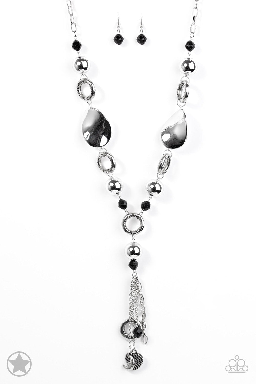 Total Eclipse Of the Heart - Silver and Black Fashion Necklace - Paparazzi Accessories - Long chain of black crystalized beads, curved plates of silver with a pearly finish, and chunky silver rings lead down to a tassel of chains and charms, including a crescent moon and a heart.