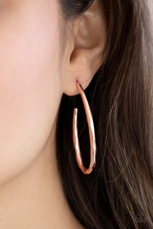 Totally Hooked - Rose Gold Hoop Earrings - Paparazzi Accessories - Delicately hammered in shimmery textures, a rose gold bar curves into an asymmetrical hook-like hoop for an edgy look. Earring attaches to a standard post fitting. Hoop measures approximately 1" in diameter. Sold as one pair of hoop earrings.