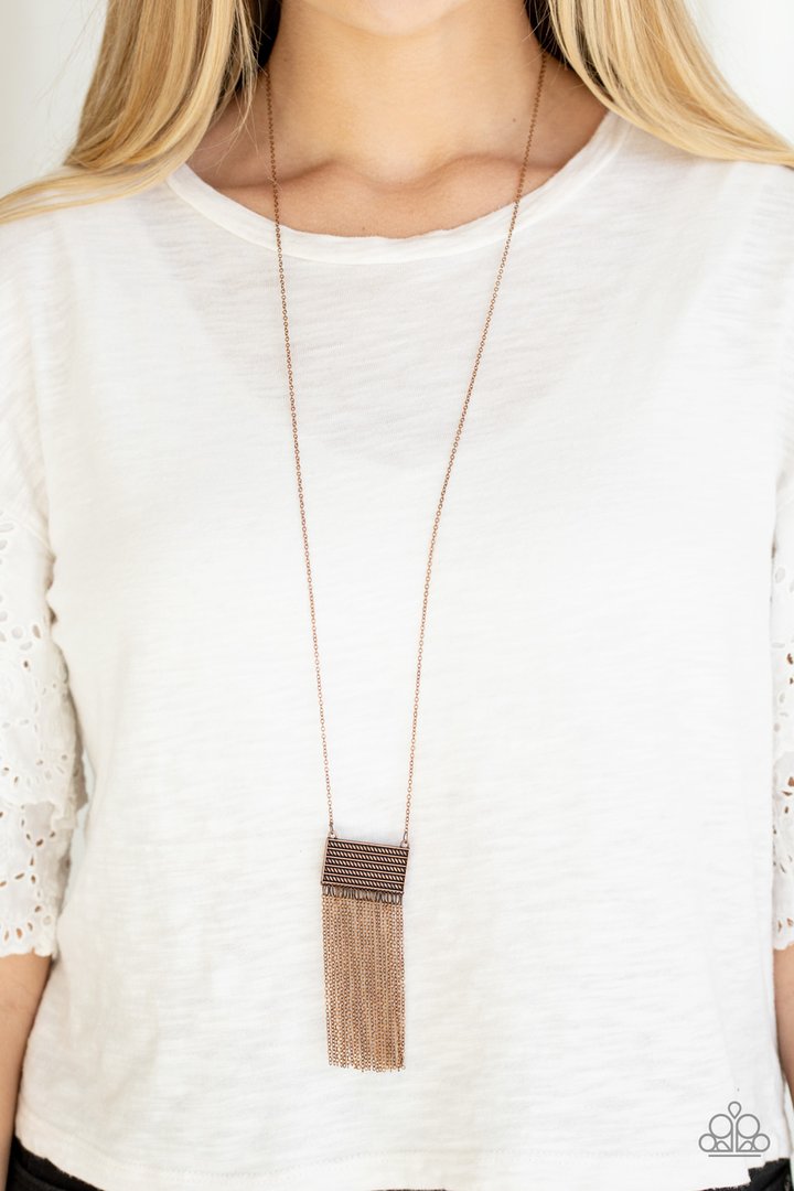 Totally Tassel - Copper - Tassel Fashion Necklace - Paparazzi Accessories - This casual fashion copper necklace is radiating with glistening copper textures, a rectangular frame gives way to a dainty copper chain tassel for a stylish look.