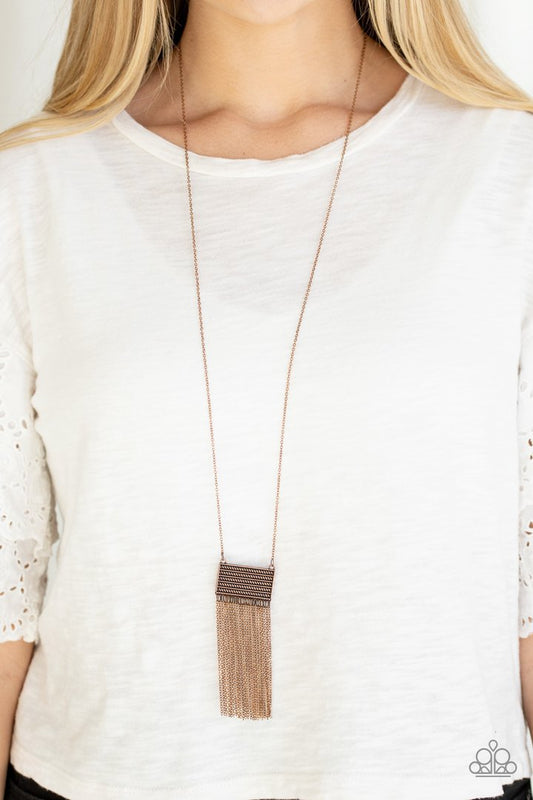 Totally Tassel - Copper - Tassel Fashion Necklace - Paparazzi Accessories - This casual fashion copper necklace is radiating with glistening copper textures, a rectangular frame gives way to a dainty copper chain tassel for a stylish look. Bejeweled Accessories By Kristie - Trendy fashion jewelry for everyone -