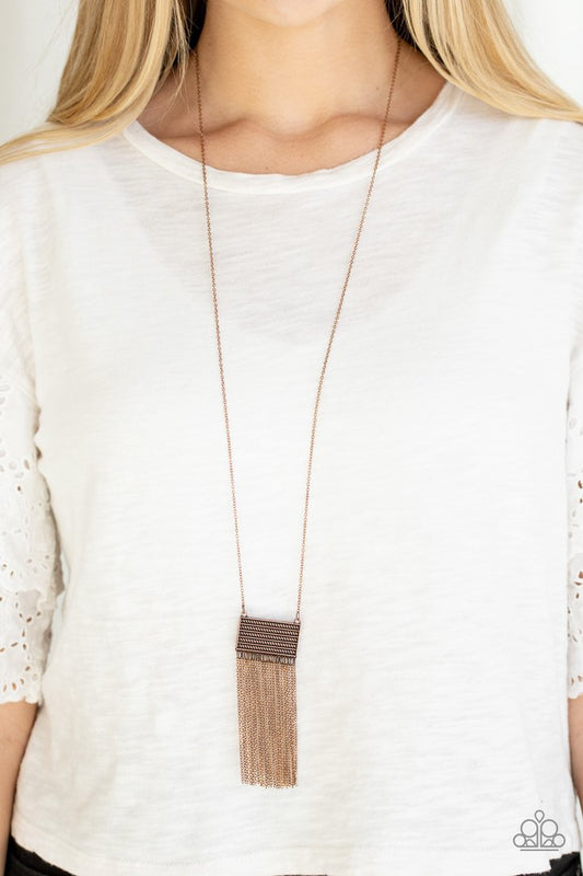 Totally Tassel - Copper - Tassel Fashion Necklace - Paparazzi Accessories - This casual fashion copper necklace is radiating with glistening copper textures, a rectangular frame gives way to a dainty copper chain tassel for a stylish look.