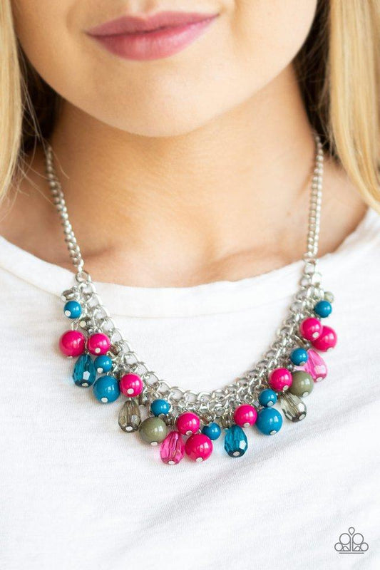 Tour de Trendsetter - Multi Color Necklace - Paparazzi Accessories - Glassy and polished blue, green, and pink beads swing from the bottom of interlocking silver chains. Crystal-like teardrops are sprinkled along the colorful beading, creating a flirtatious fringe below the collar.