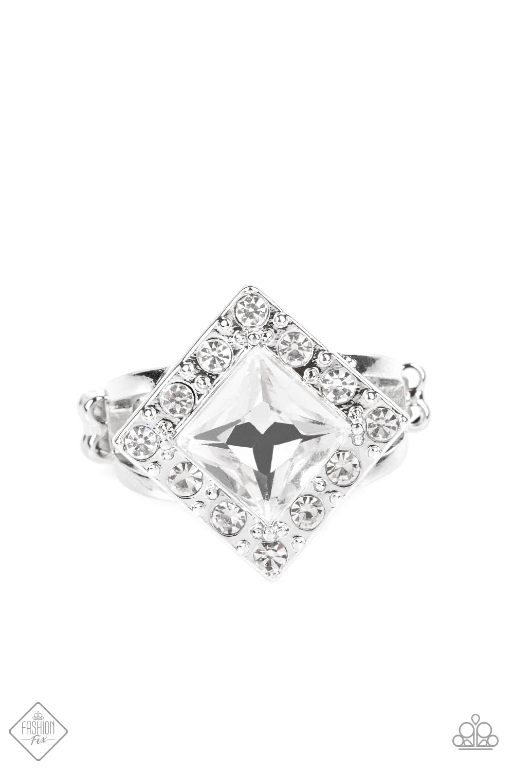Transformational Twinkle - White and Silver Fashion Ring - Paparazzi Accessories - An oversized, square-cut, white rhinestone is tilted on a point and framed by tiny white gems. As it sits atop a pair of sleek silver bands, the faceted surface of the centerpiece catches and reflects the light of the accents that surround it, magnifying its impressive impact. Features a dainty stretchy band for an adjustable flexible fit.