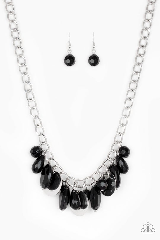 Treasure Shore - Black - Silver Necklace - Paparazzi Accessories - A collection of glassy black beads swing from the bottom of a dramatic silver chain. Glistening silver discs trickle between the colorful beads for a refreshing fringe below the collar fashion necklace.