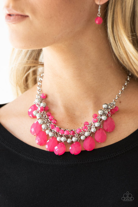 Trending Tropicana - Pink and Silver Fashion Necklace - Paparazzi Accessories - Cloudy pink beads and shiny silver beads. Brushed in an opalescent finish, pink teardrops cascade from the bottom of bold interlocking silver chains, for a dramatic colorful fringe fashion necklace.