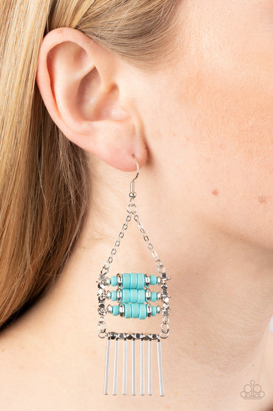 Tribal Tapestry - Blue Turquoise and Silver Earrings - Paparazzi Accessories - Silver and turquoise stone beads are threaded along metal rods between faceted silver cubes. Silver rods stream out from the bottom of the stacked display, resulting in an earthy fringe. Earring attaches to a standard fishhook fitting.