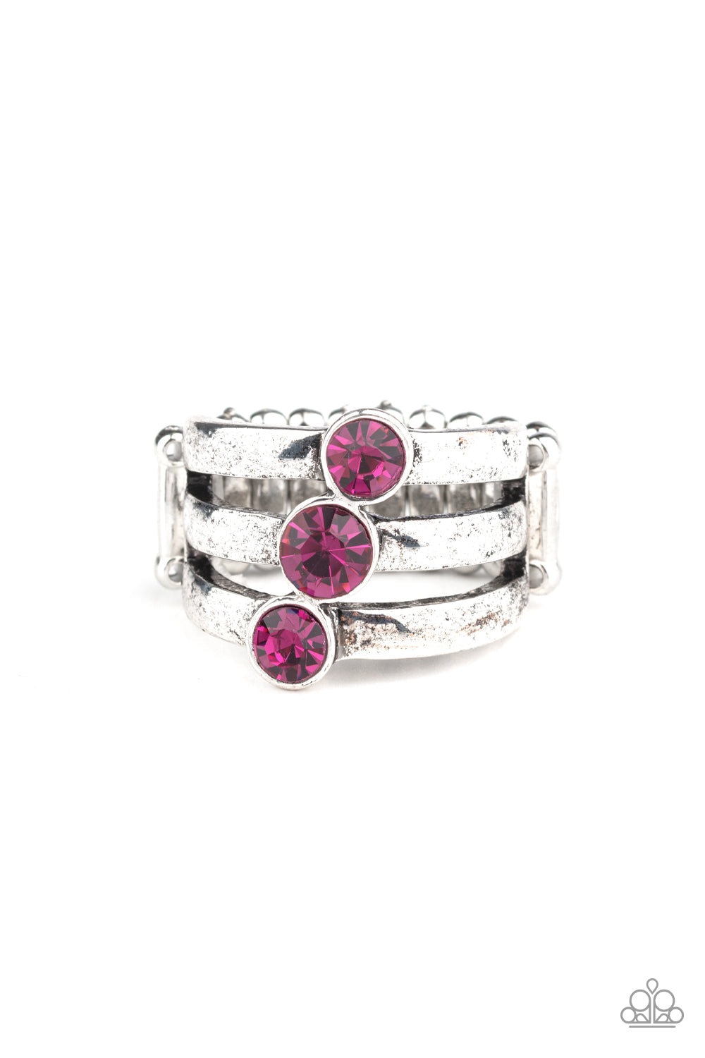 Triple The Twinkle - Pink and Silver Ring - Paparazzi Accessories - A trio of pink rhinestones slant across three stacked silver bands, coalescing into a refined centerpiece. Features a stretchy band for a flexible fit. Sold as one individual ring. Trendy fashion jewelry for everyone.