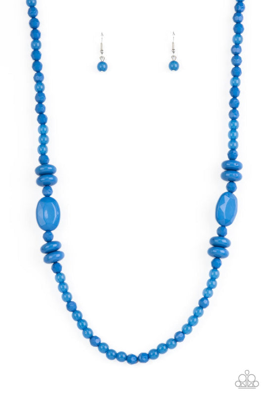 Tropical Tourist - Blue Acrylic Necklace - Paparazzi Jewelry  - Bejeweled Accessories By Kristie - Varying in size, shape, and opacity, a refreshingly blue collection of cloudy and solid acrylic beads drapes across the chest for a playful pop of color. Features an adjustable clasp closure.