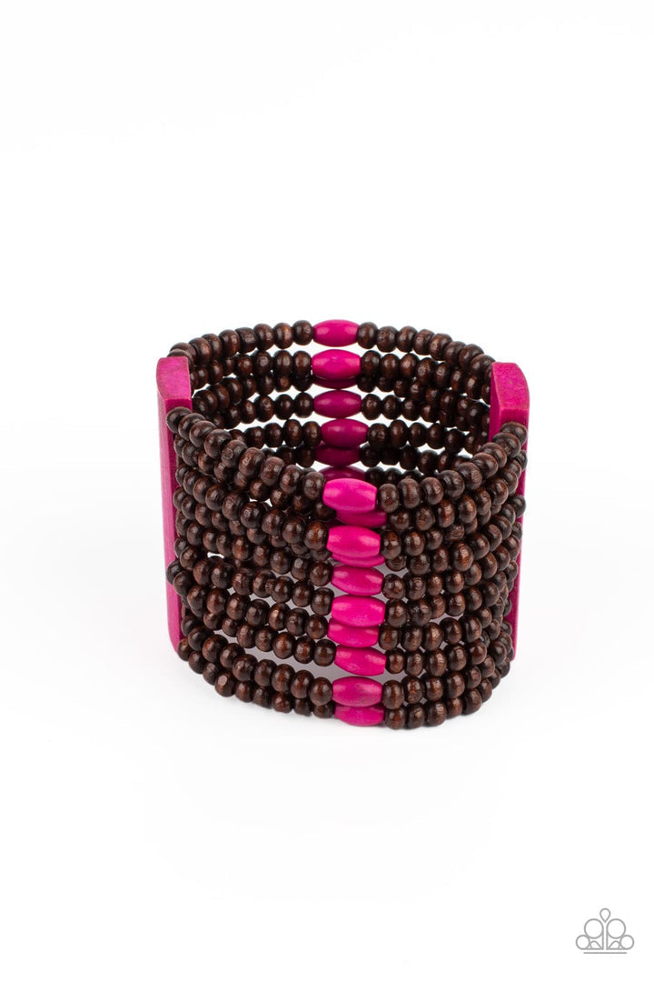 Tropical Trendsetter - Pink and Brown Wood Bracelet - Paparazzi Accessories - Stacked layers of round wooden beads are threaded along stretchy bands creating a free-spirited statement. Two pink wooden bars connect the strands while vibrant pink accent beads are lined up across the center for an island-inspired vibe.