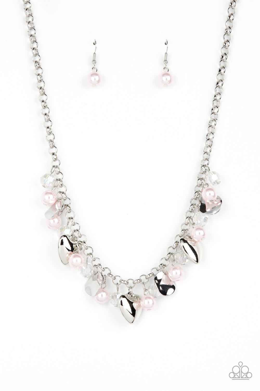 True Loves Trove - Pink Pearl and Silver Fringe Necklace - Paparazzi Accessories - Pink pearls, glassy white crystal-like beads, crinkled silver discs, and oversized locket inspired silver heart frames dance from a shiny silver chain, resulting in a romantic fringe below the collar stylish fashion necklace.