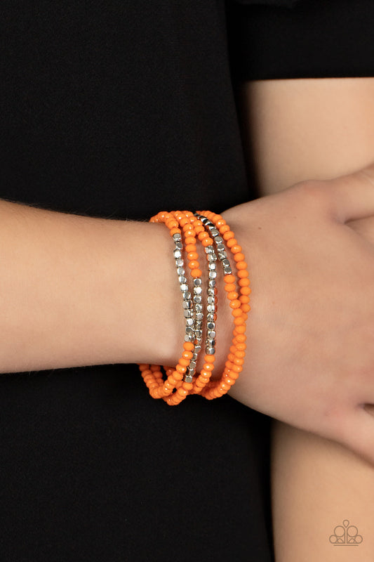 Tulum Trek - Orange and Silver Stretchy Bracelets - Paparazzi Accessories - Infused with sections of shiny silver cube beads, a flamboyant collection of faceted orange beads are threaded along stretchy bands around the wrist for a vivacious pop of color. Sold as one set of five bracelets.