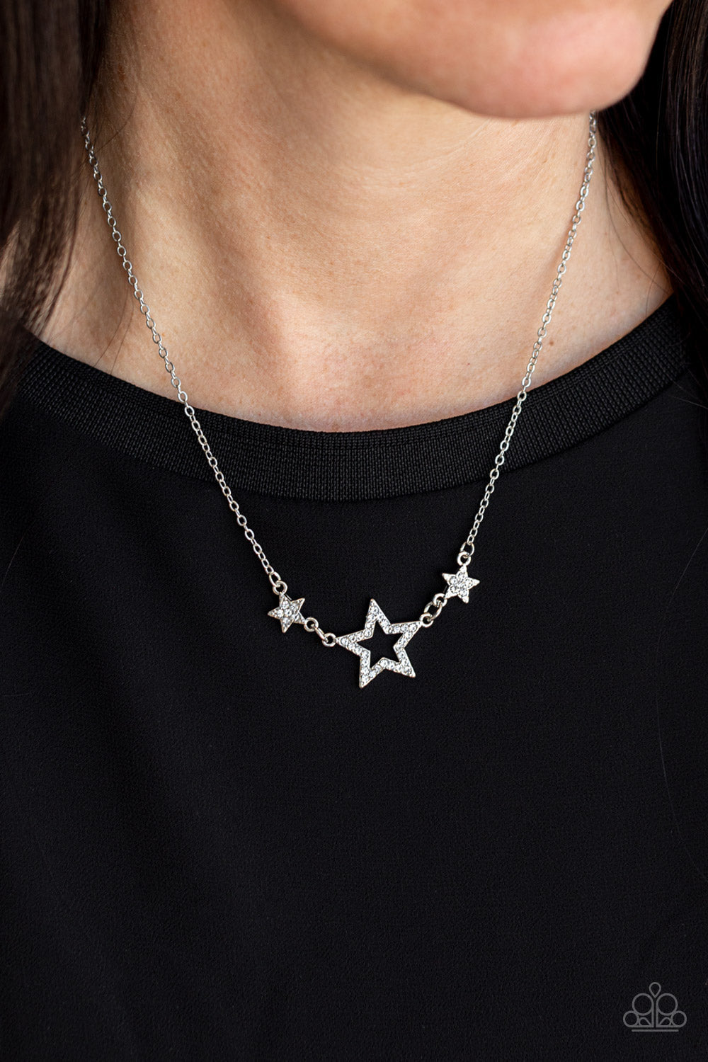 United We Sparkle Silver Patriotic Star Necklace - Paparazzi Accessories - A white rhinestone silver star is flanked by two dainty white rhinestone encrusted silver stars, creating a sparkly patriotic pendant below the collar fashion necklace.