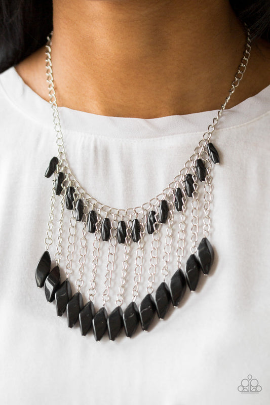 Venturous Vibes - Black and Silver Necklace - Paparazzi Accessories - A row of faceted black beads swing from the bottom of a shimmery silver chain below the collar. Larger black beads cascade from the bottoms of free-falling silver chains, creating a vivacious fringe.