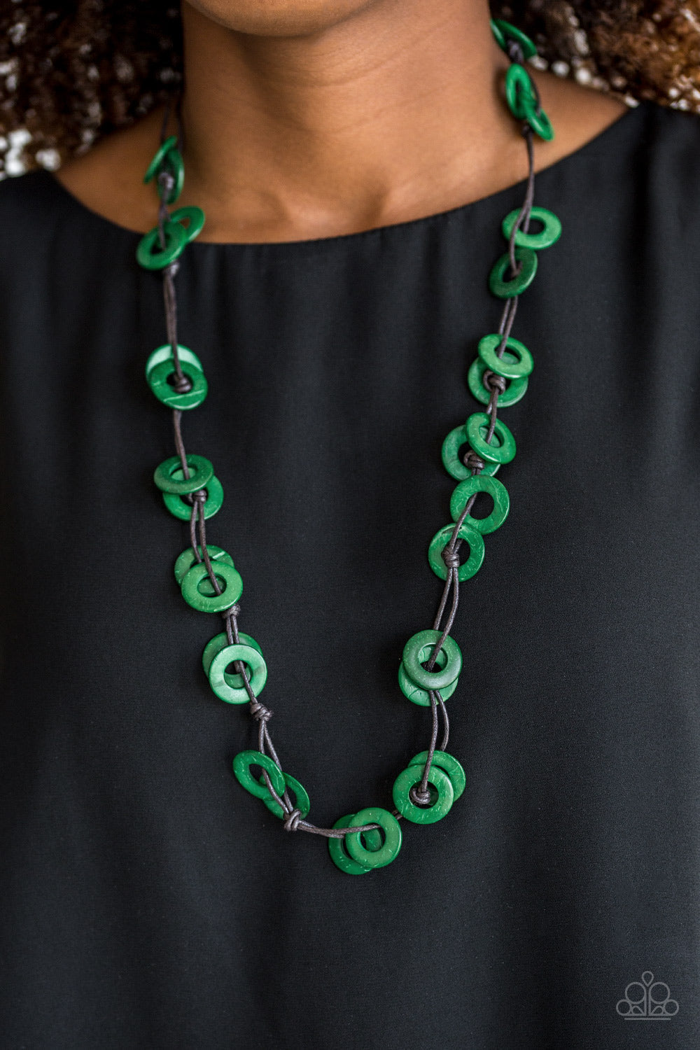 Waikiki Winds - Green Wood Necklace - Paparazzi Accessories - Shiny brown cording knots around refreshing green wooden discs, creating a colorful display across the chest. Features a button loop closure. Sold as one individual necklace.