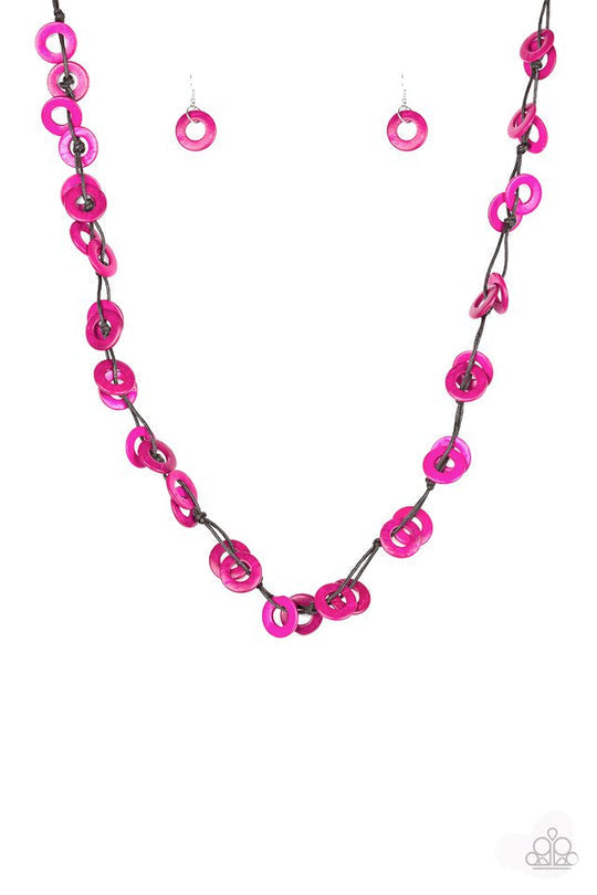 Waikiki Winds - Pink Wood Necklace - Paparazzi Accessories - Shiny brown cording knots around vivacious pink wooden discs, creating a colorful display across the chest. Features a button loop closure. Sold as one individual necklace.