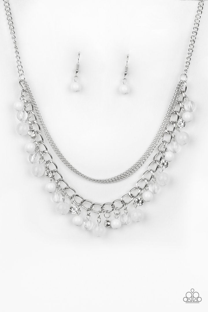 Wait and SEA - White and Silver Necklace - Paparazzi Accessories - Infused with layers of mismatched silver chains, glassy, polished white, and glittery white rhinestones swing from the bottom of a bold silver chain, creating a bubbly fringe below the collar. Features an adjustable clasp closure. Sold as one individual necklace.