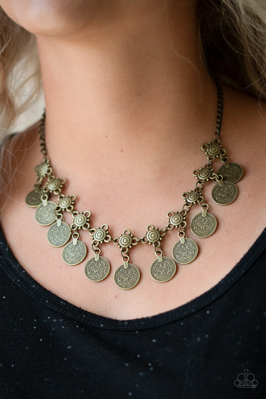 Walk The Plank - Brass Fashion Necklace - Paparazzi Accessories -Coin-like discs swing from the bottoms of ornate brass frames, creating a boisterous fringe below the collar. Necklace features an adjustable clasp closure. 