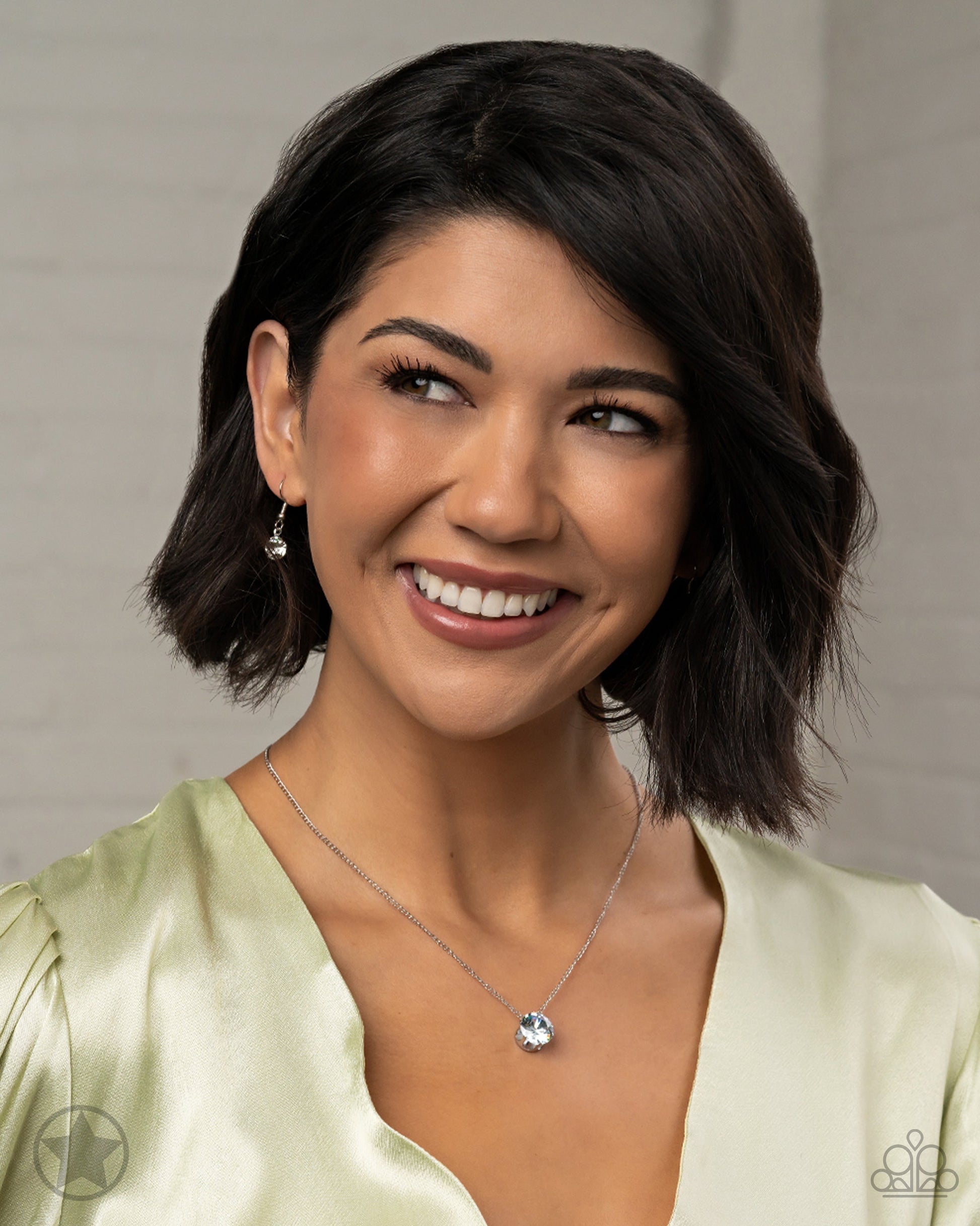 What A Gem - White and Silver Necklace - Paparazzi Accessories A single rhinestone sparkles brilliantly at the bottom of a dainty silver chain, creating a stunning solitaire design. Features an adjustable clasp closure fashion necklace. Bejeweled Accessories By Kristie - Trendy fashion jewelry for everyone -