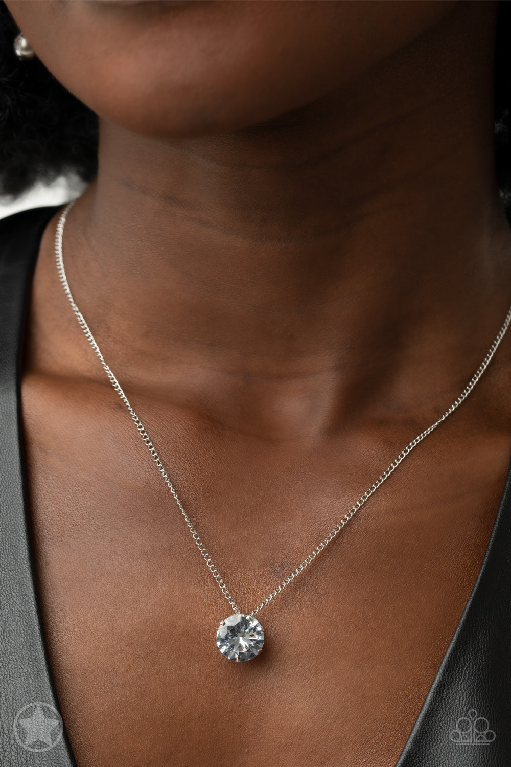 What A Gem - White and Silver Necklace - Paparazzi Accessories - A single rhinestone sparkles brilliantly at the bottom of a dainty silver chain, creating a stunning solitaire design. Features an adjustable clasp closure necklace. Bejeweled Accessories By Kristie - Trendy fashion jewelry for everyone -