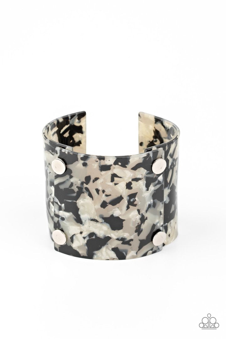 What Are You Waiting Faux? Silver and Black Acrylic Cuff Bracelet - Paparazzi Accessories - Featuring a shell-like finish, pieces of iridescent acrylic frames are bolted in place into a stylish cuff around the wrist. Sold as one individual fashion bracelet. 