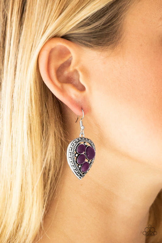 Wild Heart Wonder - Purple and Silver Fashion Earrings - Paparazzi Accessories - Polished purple beads are sprinkled across the center of an asymmetrical heart-shaped frame for a whimsical stylish fashion earrings. Fishhook fitting earrings.