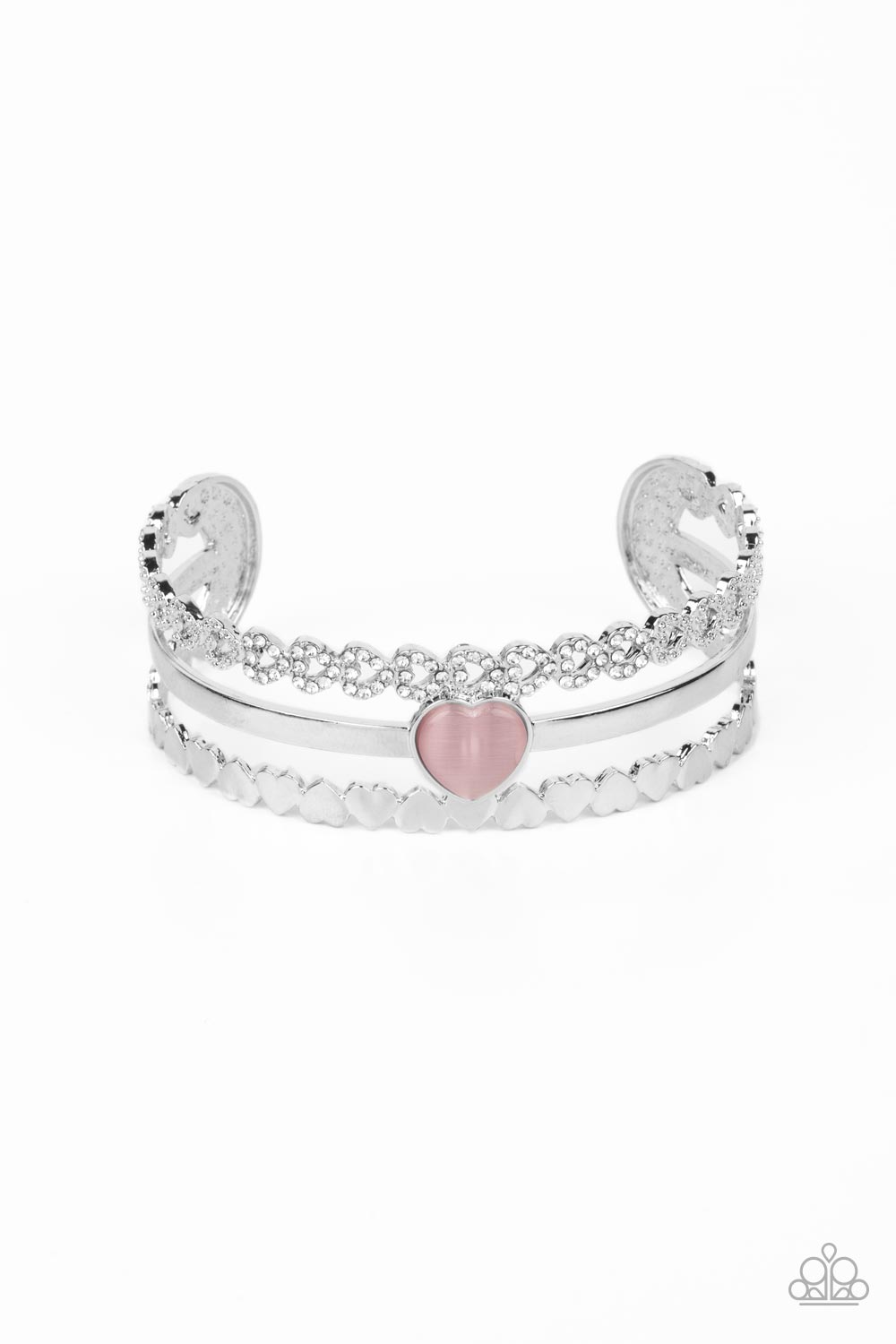You Win My Heart - Pink and Silver Heart Bracelet - Paparazzi Accessories - Three bands of silver arc across the wrist to create a romantic-inspired cuff. A row of white rhinestone-studded hearts are turned on their sides, gracing the top band of the cuff while solid silver hearts alternate end-over-end to create the bottom band. A sleek bar of silver topped with a light pink, heart-shaped, cat's eye stone falls between the outer bands, emerging as a polished focal point in a whimsical finish.